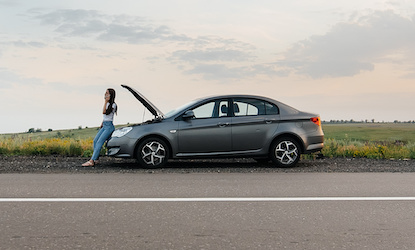 Roadside assistance tech helping a stranded driver in Atlanta, GA